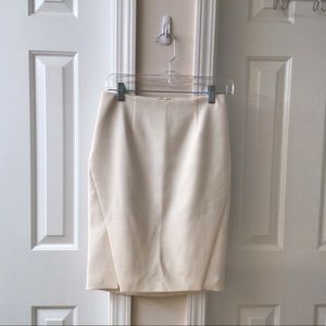 White House Black market winter white pencil skirt with double front slits.